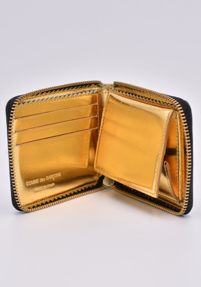 Comme des garcons gold wallet on sale